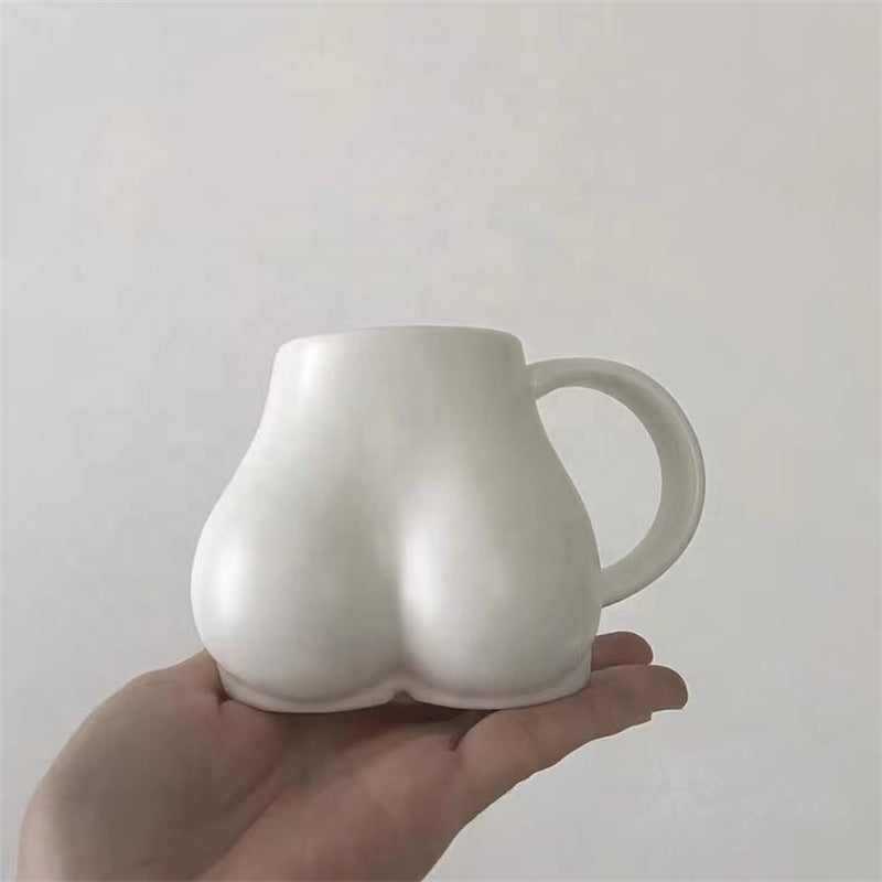 Koffiekopje met Vrouwelijke Rondingen