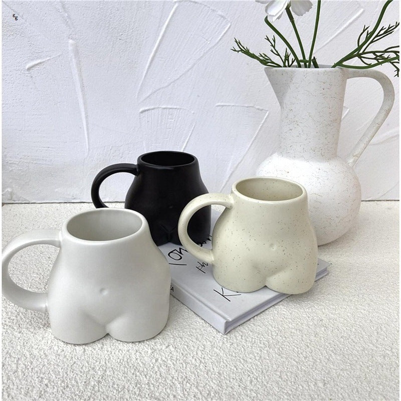 Koffiekopje met Vrouwelijke Rondingen
