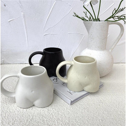 Koffiekopje met Vrouwelijke Rondingen