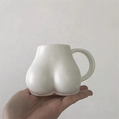 Koffiekopje met Vrouwelijke Rondingen