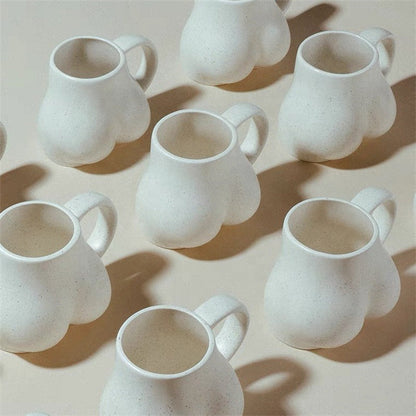 Koffiekopje met Vrouwelijke Rondingen