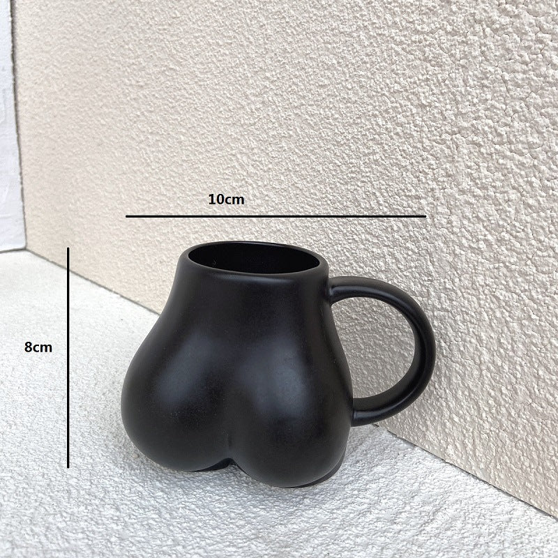 Koffiekopje met Vrouwelijke Rondingen