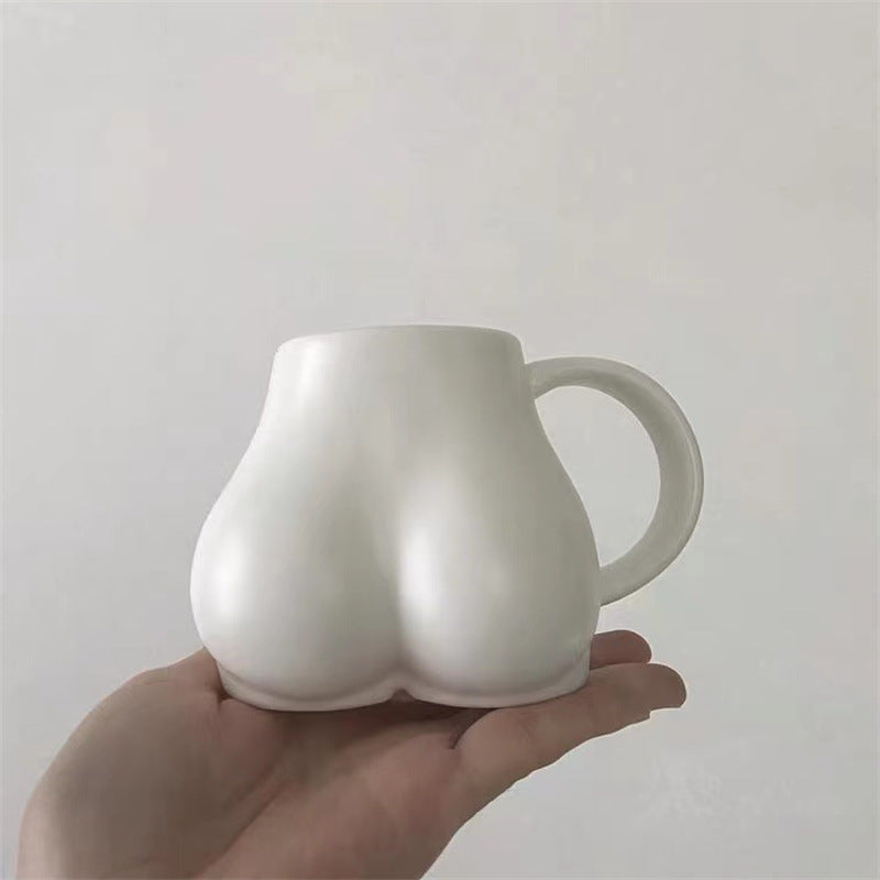 Koffiekopje met Vrouwelijke Rondingen